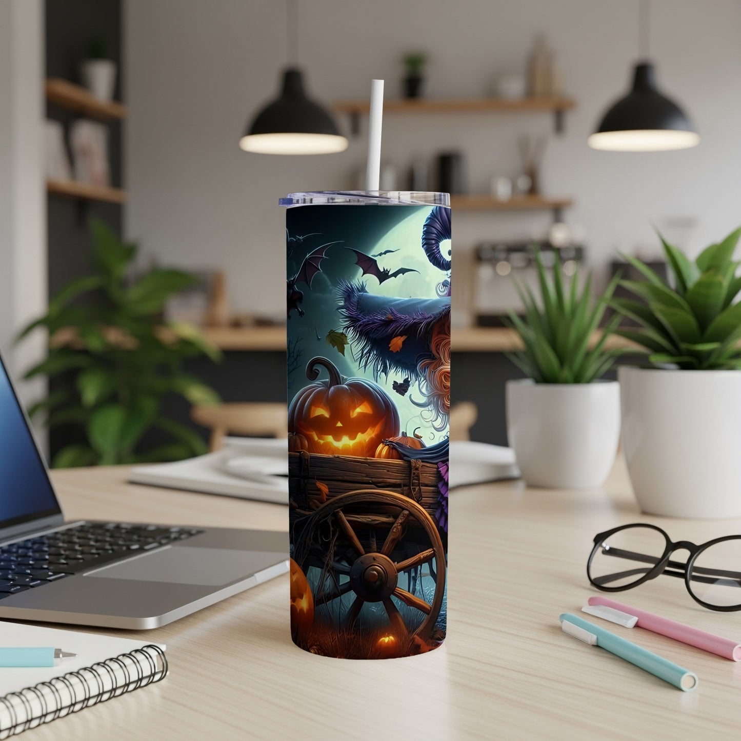 Tumbler with Halloween scene featuring a witch's hat, pumpkin, bats, and moon.