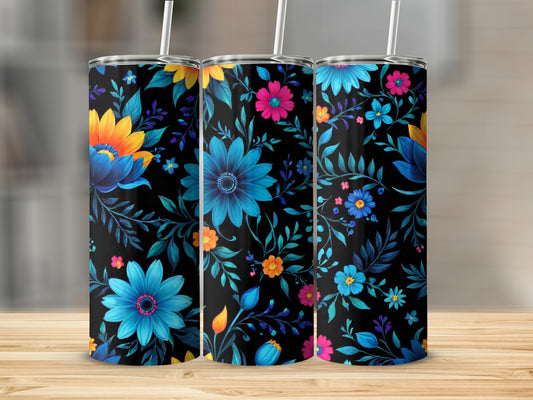 Three tumblers with a black background and vibrant floral designs.