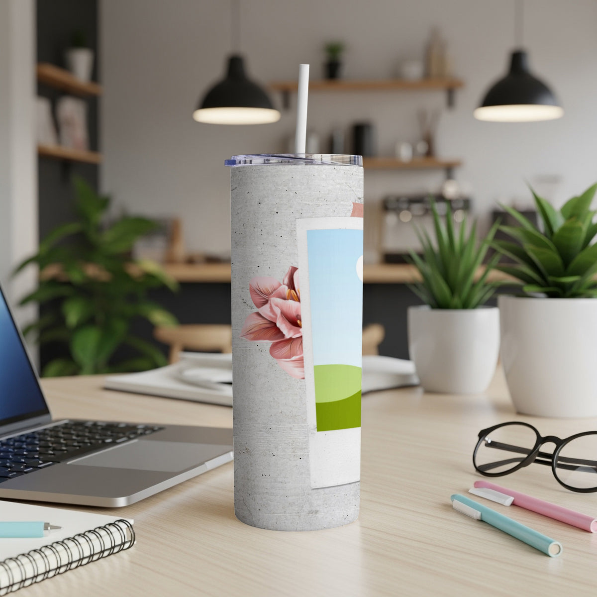 Concrete tumbler with pink flower and landscape photo decal, straw in lid.