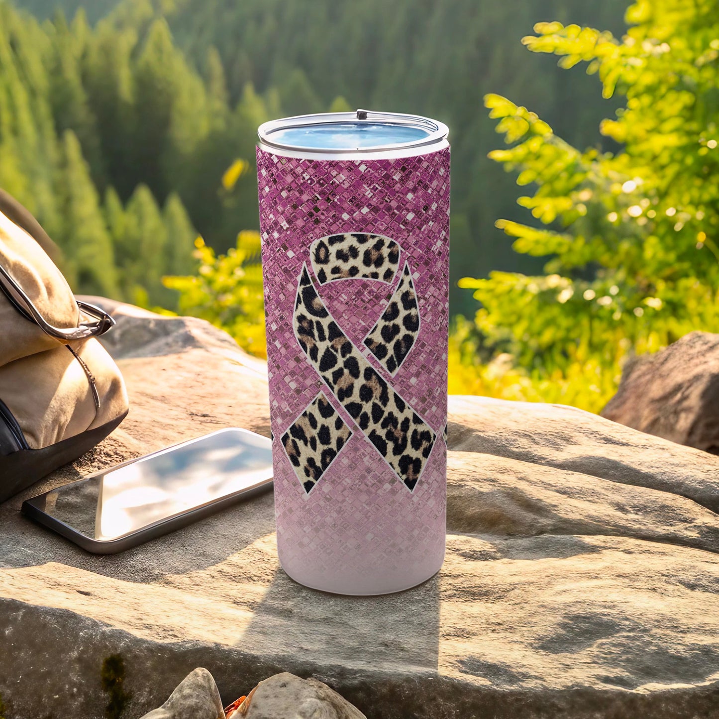 Pink tumbler with leopard print awareness ribbon and mosaic pattern.