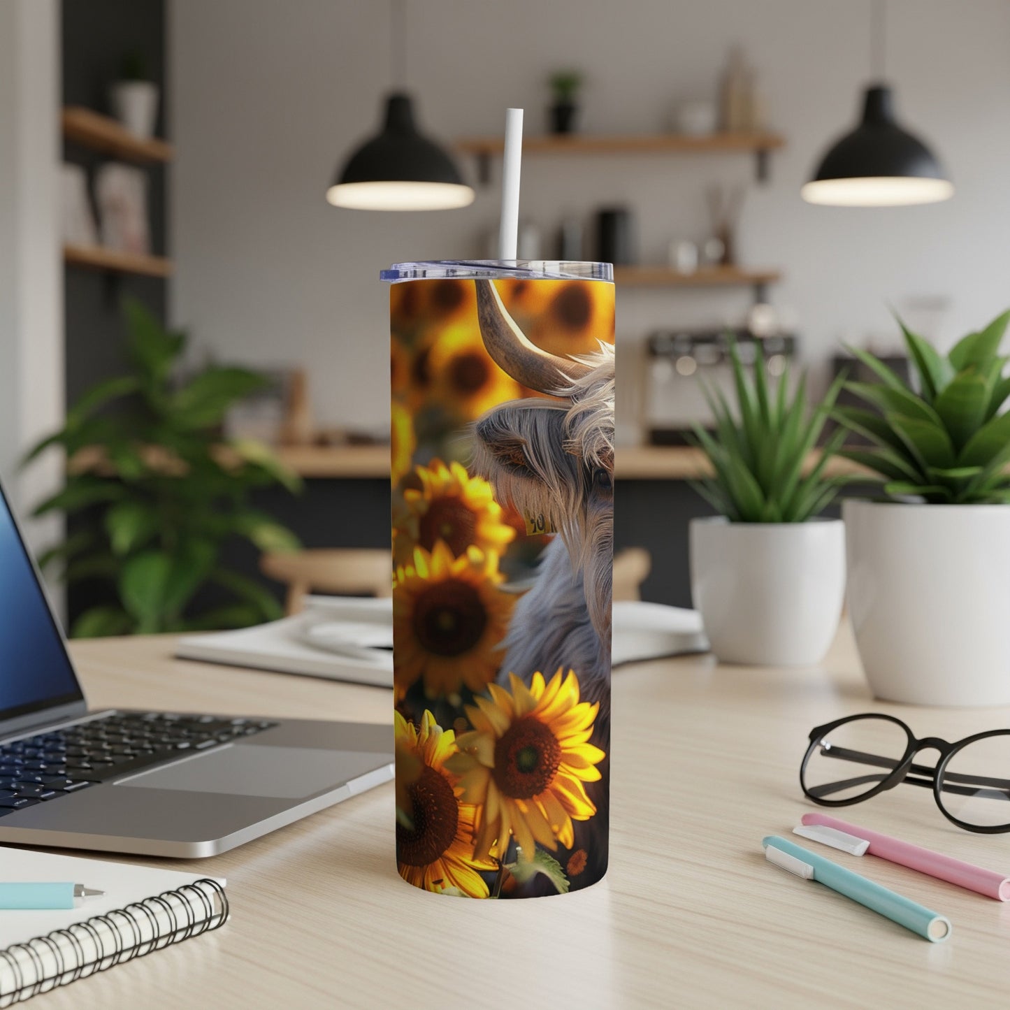 Highland cow and sunflowers on a skinny tumbler.