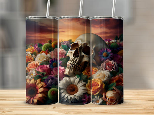 Skull among vibrant flowers against a sunset sky.