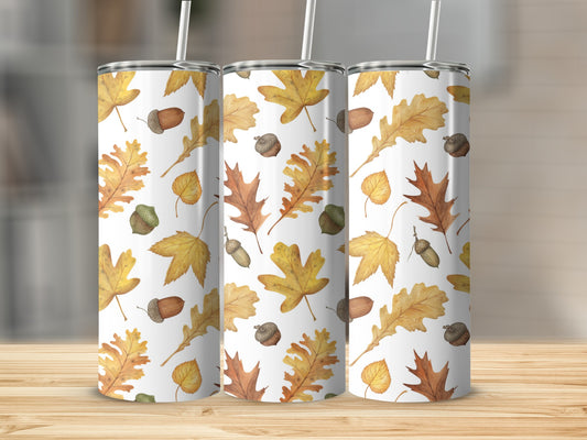 Three tumblers with a fall leaf and acorn pattern.