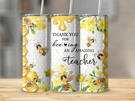 Tumbler with bees, honeycomb, flowers, and "Thank you for being an amazing teacher" text.