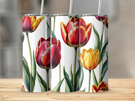 Three tumblers with a repeating pattern of red and yellow tulips.