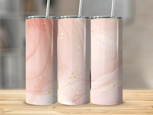 Three tumblers with pink and gold watercolor abstract design, displayed on wooden surface.