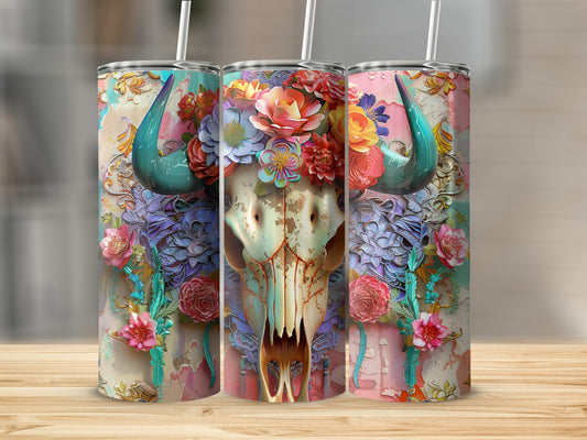Skull with floral headdress and ornate colorful design on a tumbler.