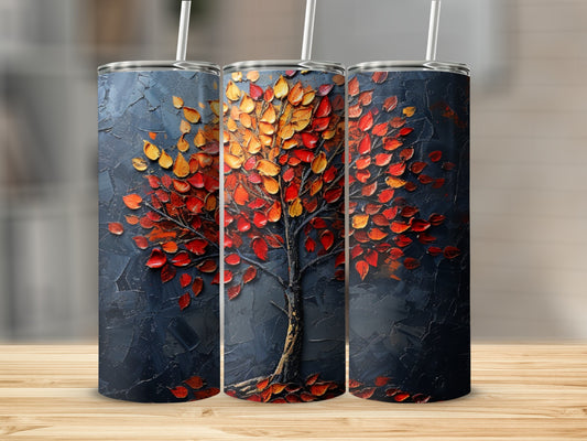 Tall tumbler with a textured, colorful tree design in warm autumn tones.