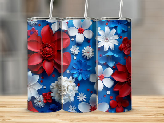 Three tumblers with red, white, and blue floral designs on a wooden surface.