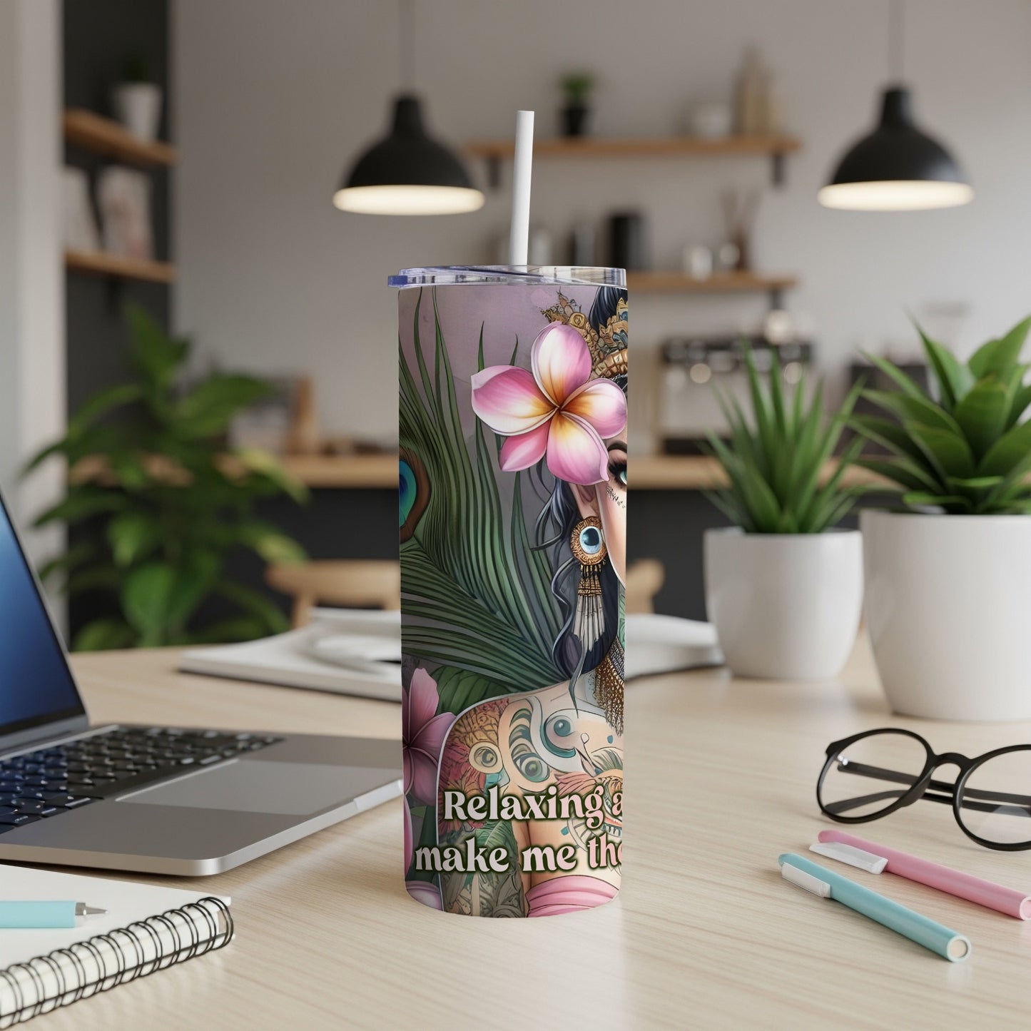 Woman with flowers and peacock feathers on a tumbler with text "Relaxing does not make me".
