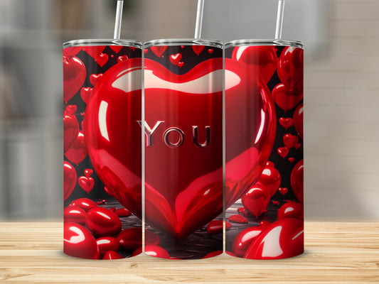 Three tall tumblers with a heart pattern and "YOU" text.