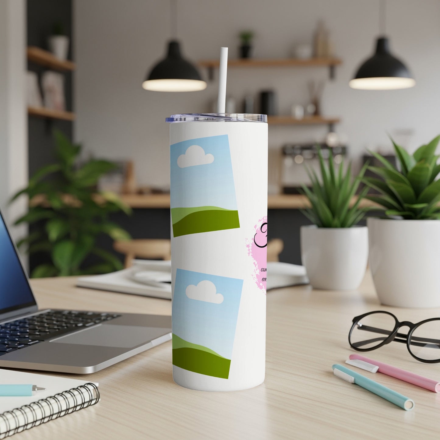 White tumbler with sky and landscape photos and pink "G" design.