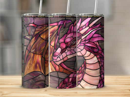 Three stained glass tumblers with dragon motifs on a wooden surface.