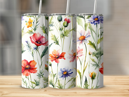 Three tumblers with a vibrant watercolor floral pattern featuring poppies and wildflowers.