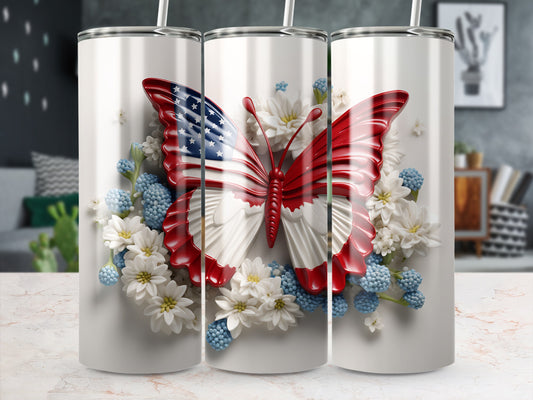 Butterfly tumbler with American flag pattern and floral accents.