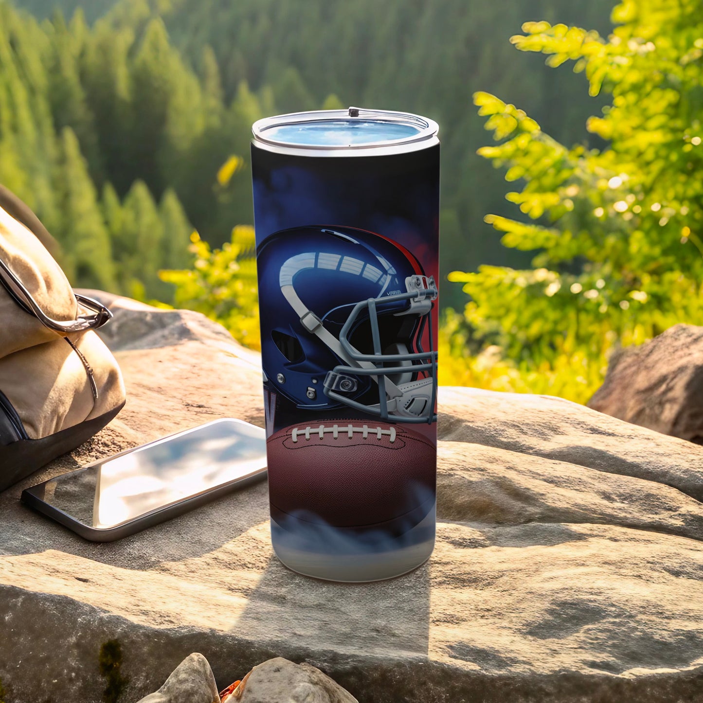 Tall tumbler featuring a football helmet and ball design with smoky accents.
