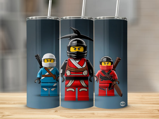 Three Lego Ninjago characters on a cylindrical tumbler with a wooden background.