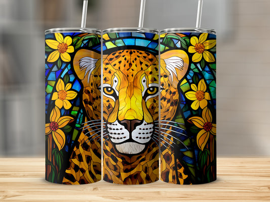Leopard face with stained glass floral pattern on three tumblers.