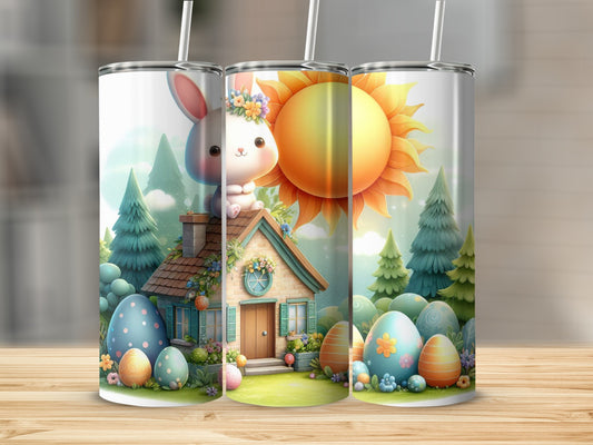 Easter bunny with sun, eggs, and a house on a tumbler.