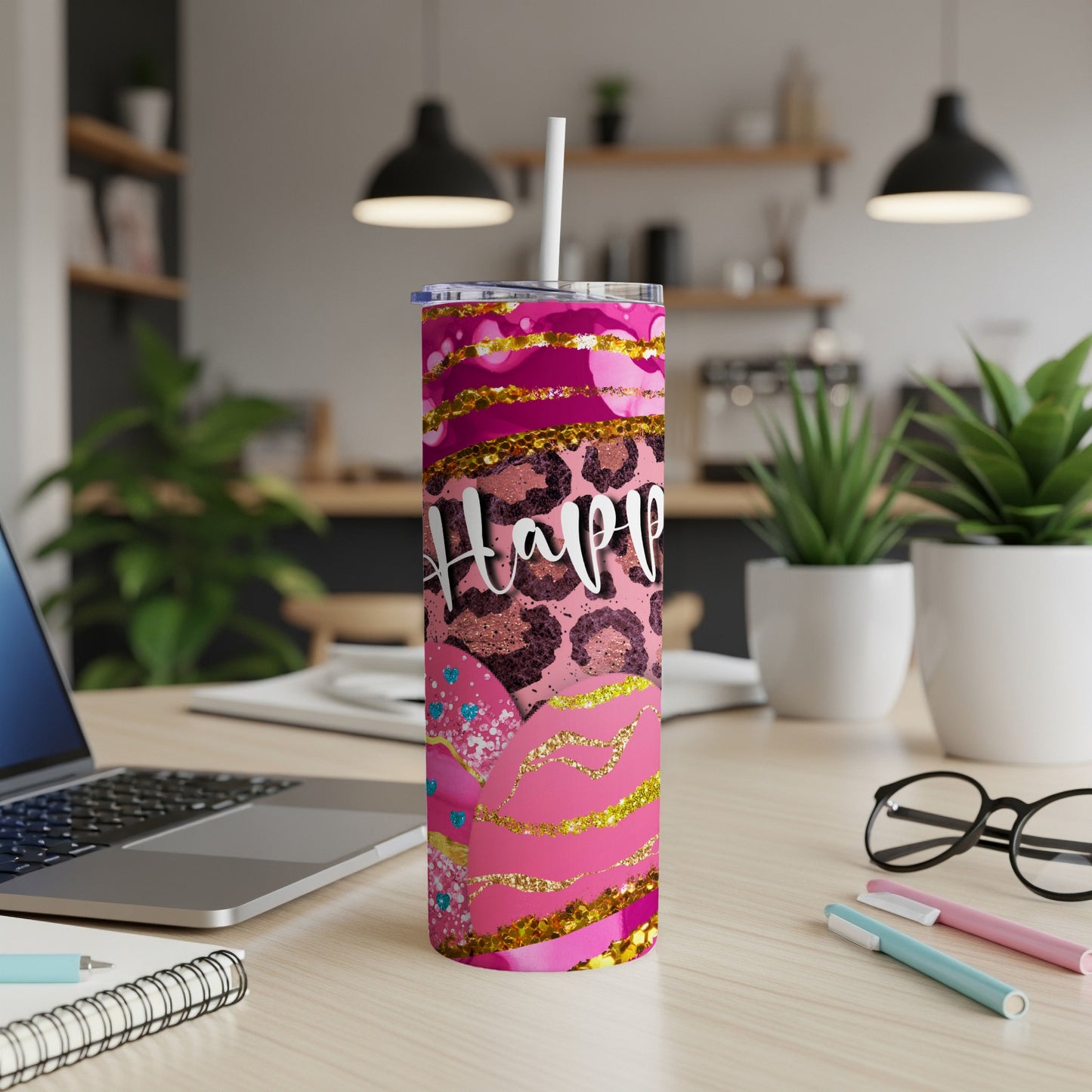Pink and gold glitter tumbler with "Happy" text and leopard print.