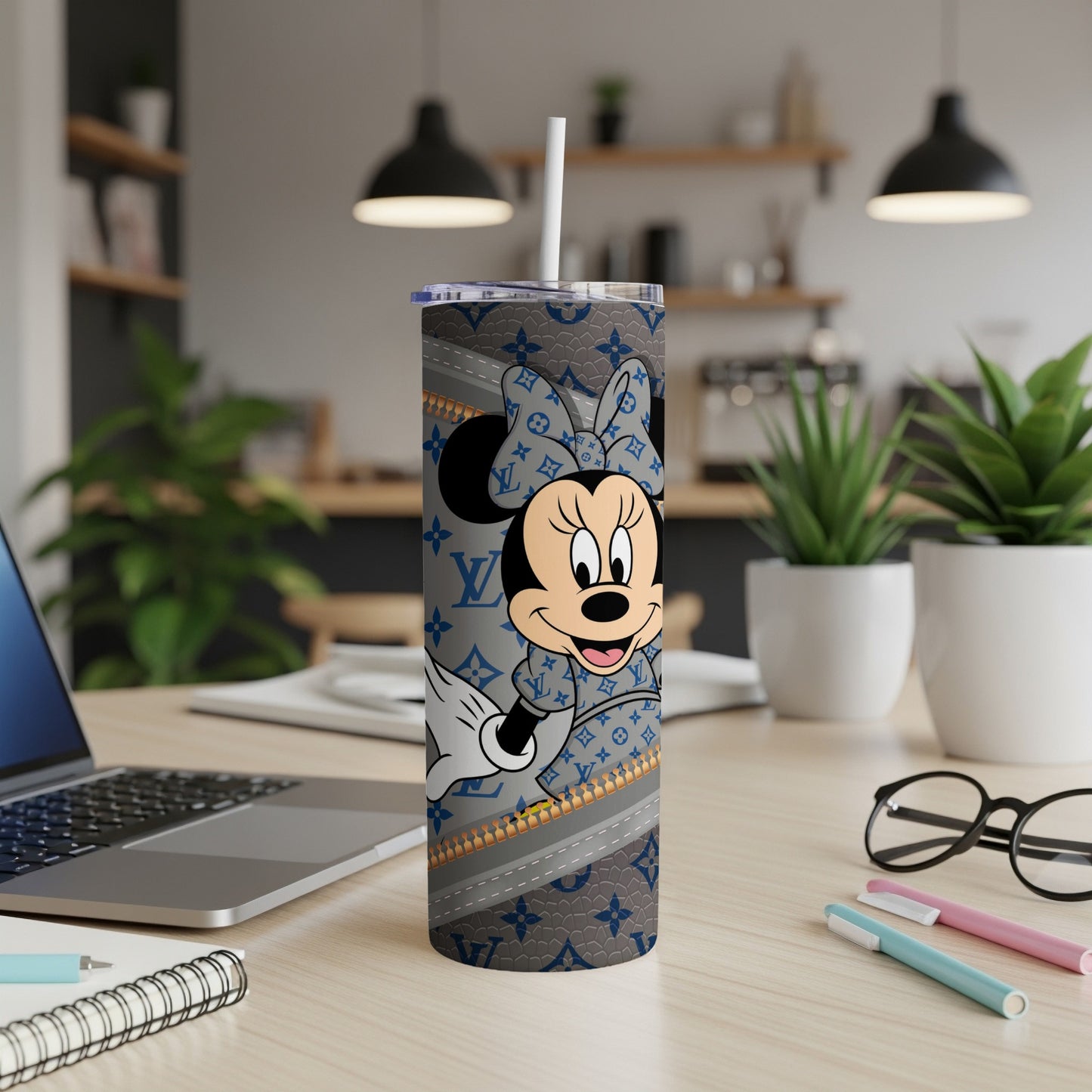Minnie Mouse tumbler with gray Louis Vuitton-inspired pattern and zipper detail.