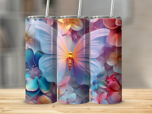 Three tumblers with vibrant floral and butterfly designs.