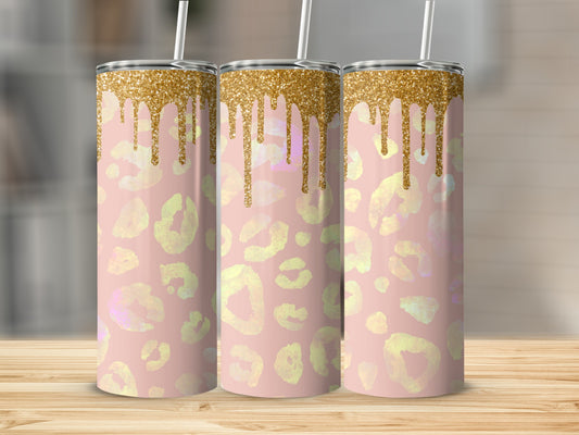 Pink leopard print tumbler with gold glitter drips and straw.
