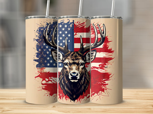 Deer with American flag design on three travel tumblers.