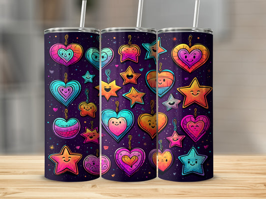 Three tumblers with colorful heart and star doodle art on a wooden surface.