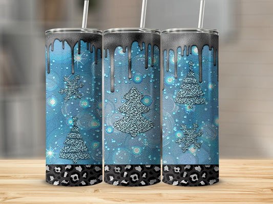 Three blue tumblers with dripping black tops and leopard print bases.