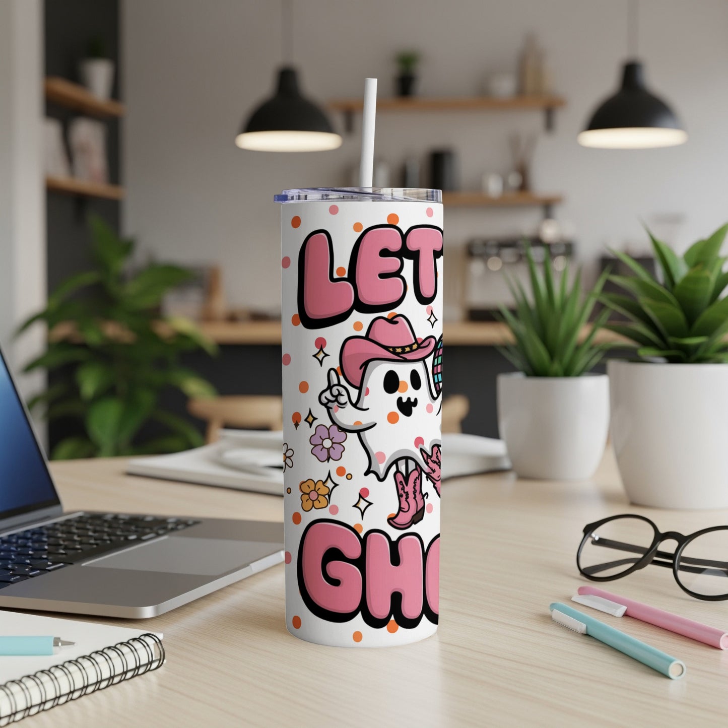 White tumbler with ghost wearing cowboy hat and boots, text "LET'S GHOST".