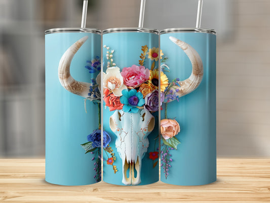 Skull with flowers on teal background on a wooden surface.