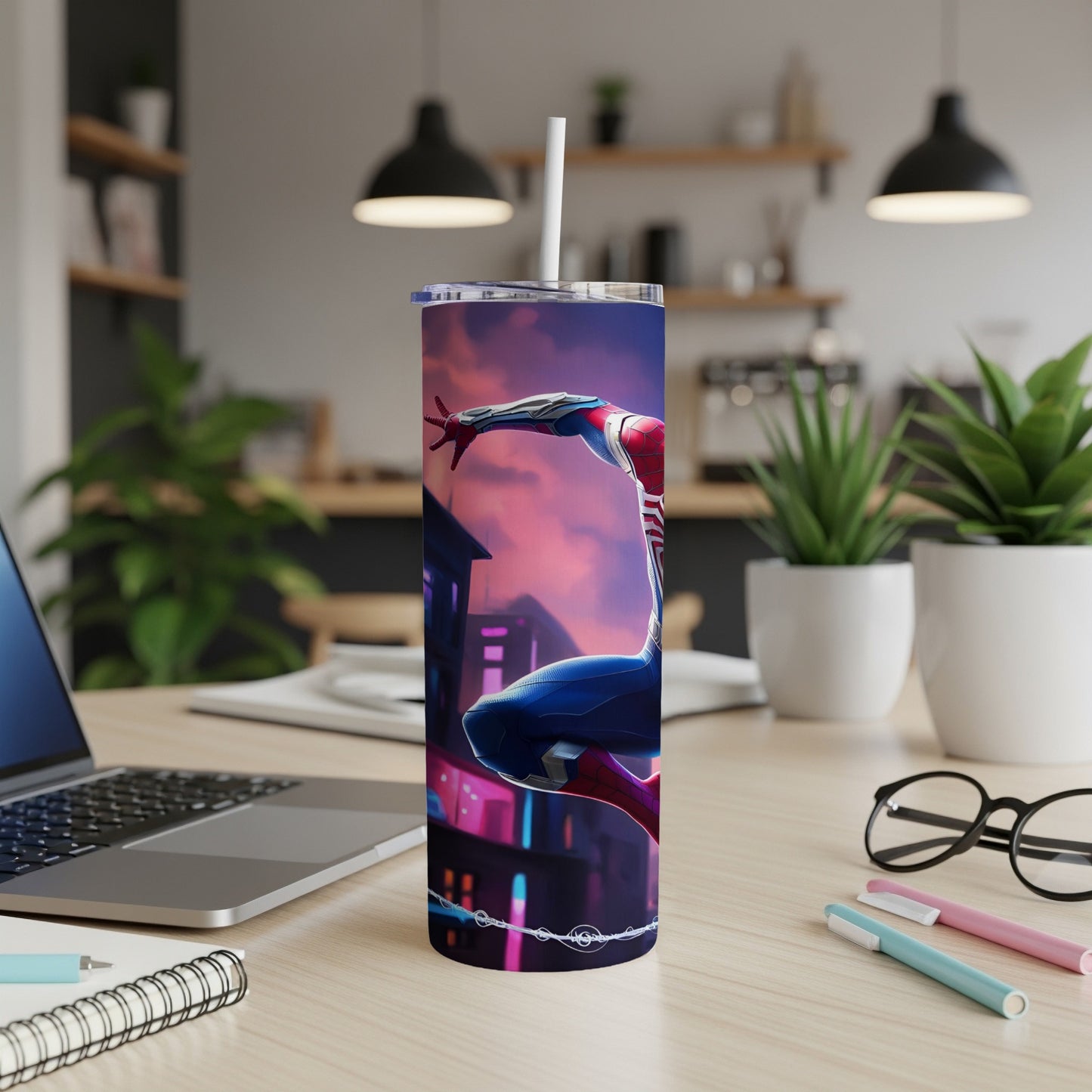 Spider-Man superhero art on a stainless steel tumbler with a straw.
