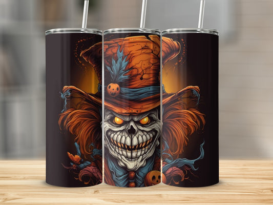 Tumbler featuring a scary clown with glowing eyes and a pumpkin hat.