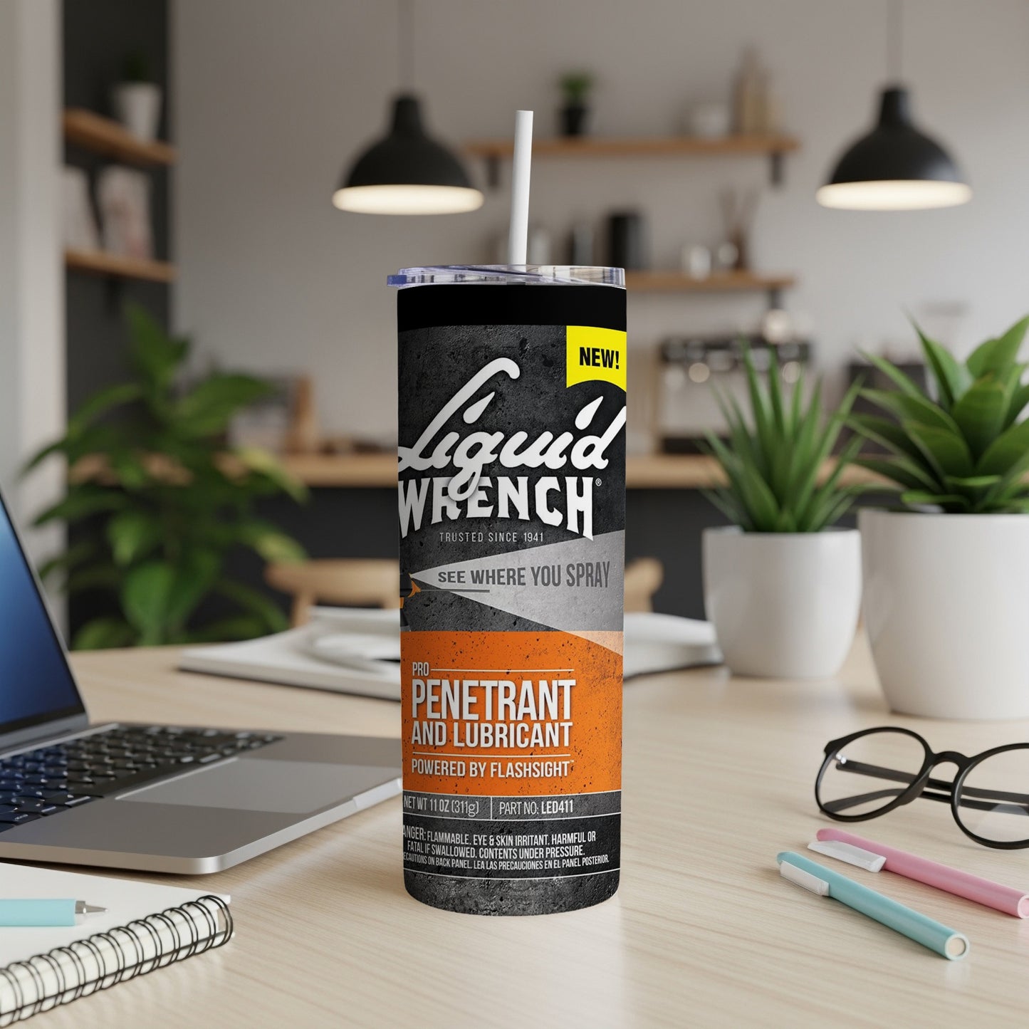 Liquid Wrench Pro Penetrant and Lubricant can with spray nozzle, on desk.