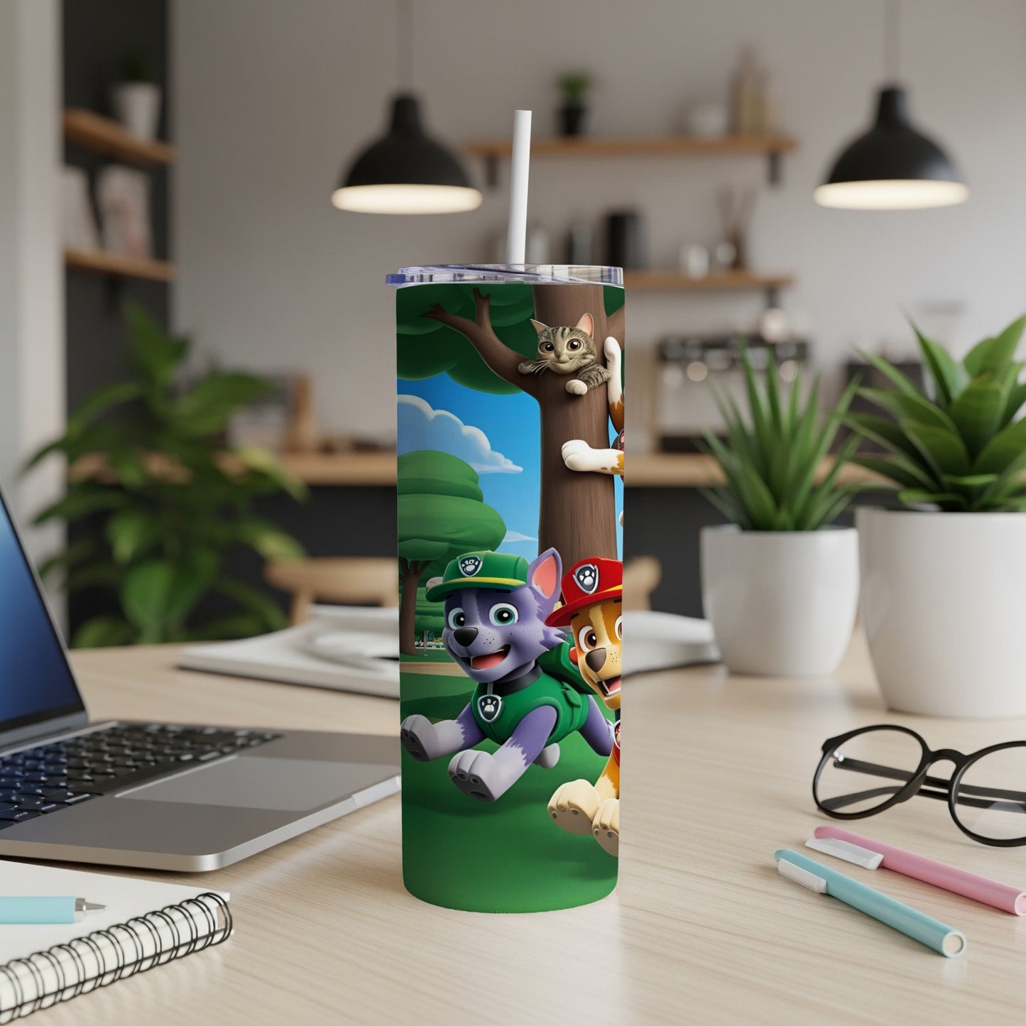Paw Patrol characters Chase and Marshall on a green tumbler with a cat peeking over the top.