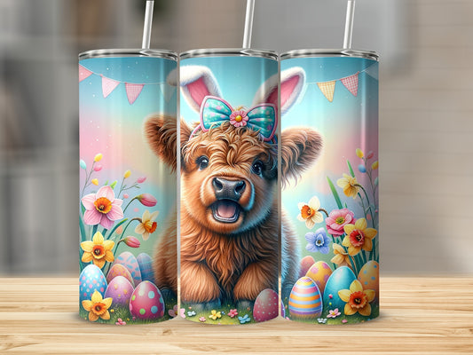 Fluffy baby cow with Easter bunny ears and colorful eggs.