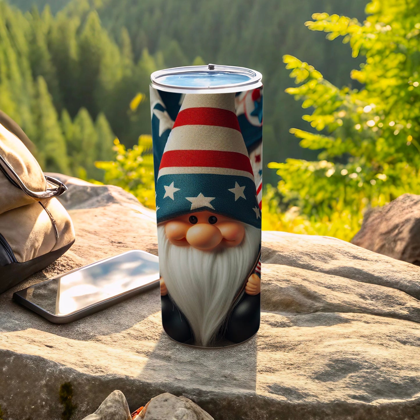 Gnome with American flag hat and overalls on a rock.