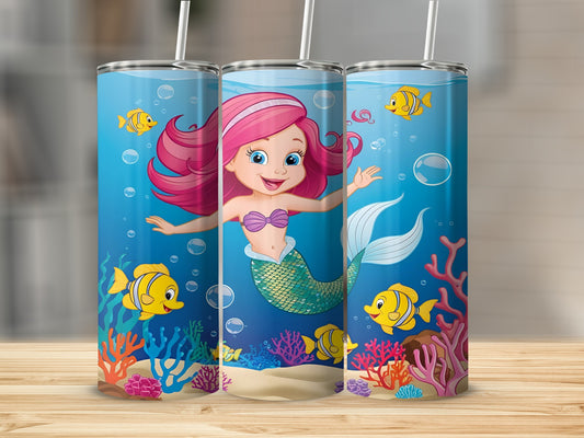 Cartoon mermaid with pink hair swimming with yellow fish and coral.