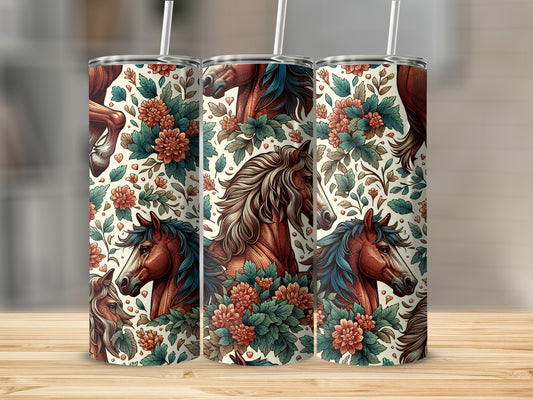 Tumbler with repeating pattern of horses and floral designs.