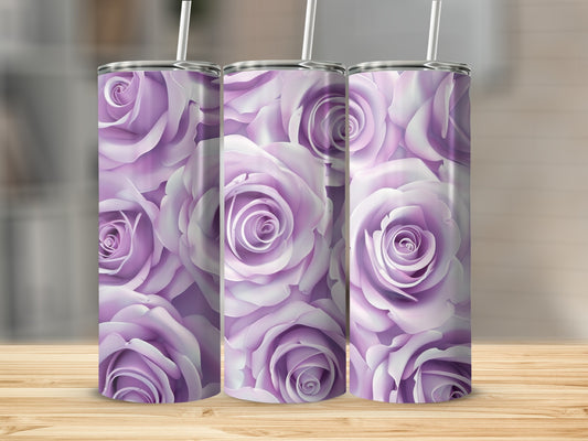 Three purple rose pattern tumblers with straws on a wooden surface.