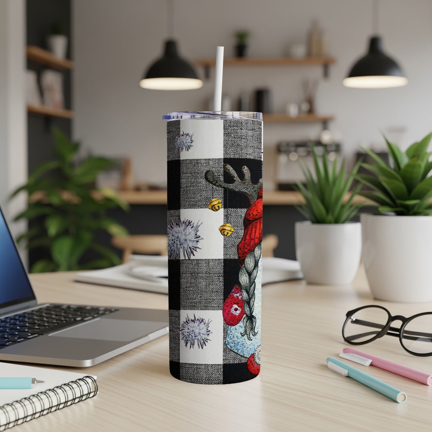 Christmas gnome tumbler with plaid, snowflakes, and reindeer antlers.