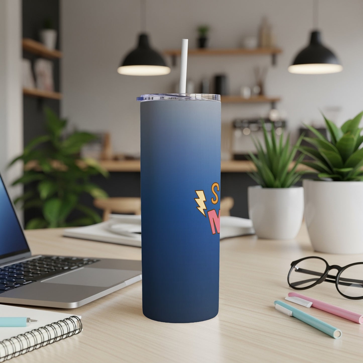 Blue ombre tumbler with "Super Mom" text in yellow and pink lettering.
