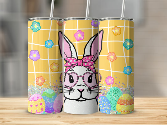 Easter bunny with pink glasses and colorful eggs on a yellow checkered background.