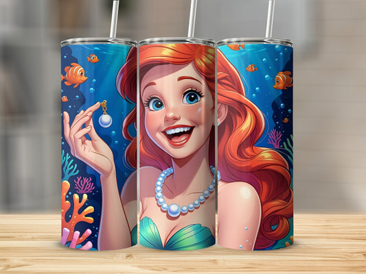 Ariel from The Little Mermaid holds a pearl necklace, smiling.