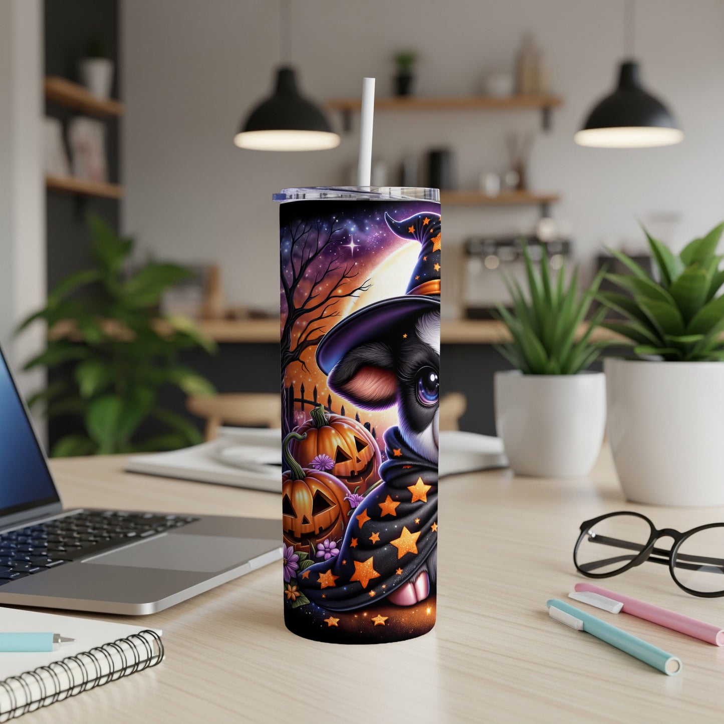 Halloween tumbler featuring a black and white cow in a witch hat and starry cloak.