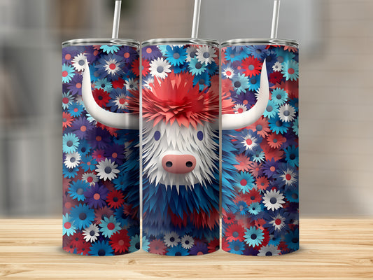 Floral yak tumbler with straw on wooden surface.