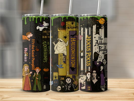 Three tumblers with Halloween-themed designs featuring Hocus Pocus and The Addams Family.