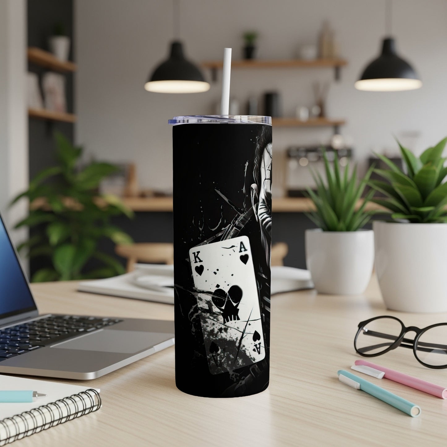 Black tumbler with King and Ace of Hearts playing cards and skull graphic.