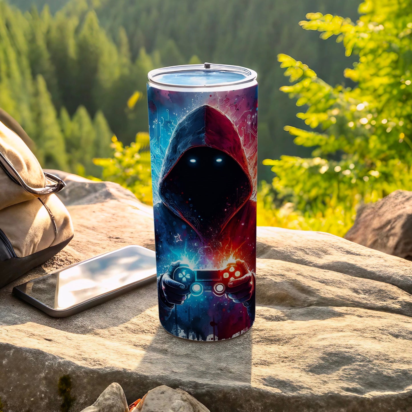 Tumbler with gamer design, glowing eyes, and controller, set outdoors.